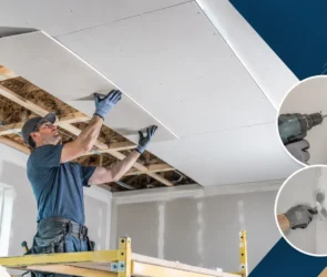 Worker installing drywall ceiling panels in a residential room using scaffold during ceiling drywall installation process