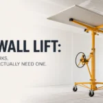 A professional yellow drywall lift holding a large sheet of gypsum board perfectly flat against a high ceiling, demonstrating how the mechanical crank and locking wheels allow for safe, solo installation.