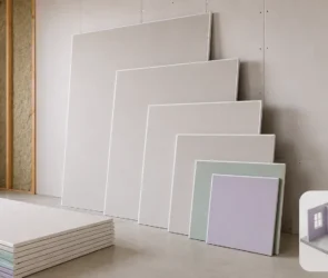 Blog featured image guide on drywall sizes and thickness options, showcasing a stack and staggered lineup of various plasterboard sheets next to an open wall frame, with circular edge-profile insets detailing one-quarter inch, three-eighths inch, one-half inch, and five-eighths inch options alongside a small 3D residential layout diagram.